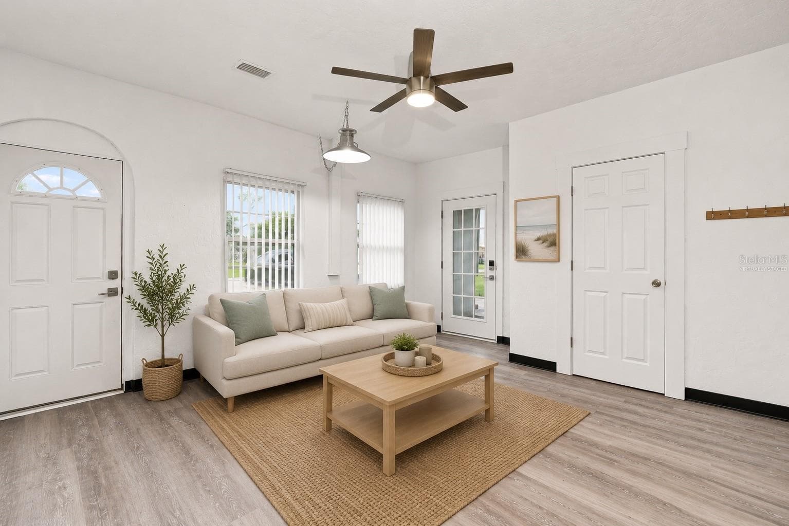 Virtually Staged Bright and Inviting Family Room with with Vaulted Ceilings and New Flooring - 1005 ALSTON LN, ENGLEWOOD