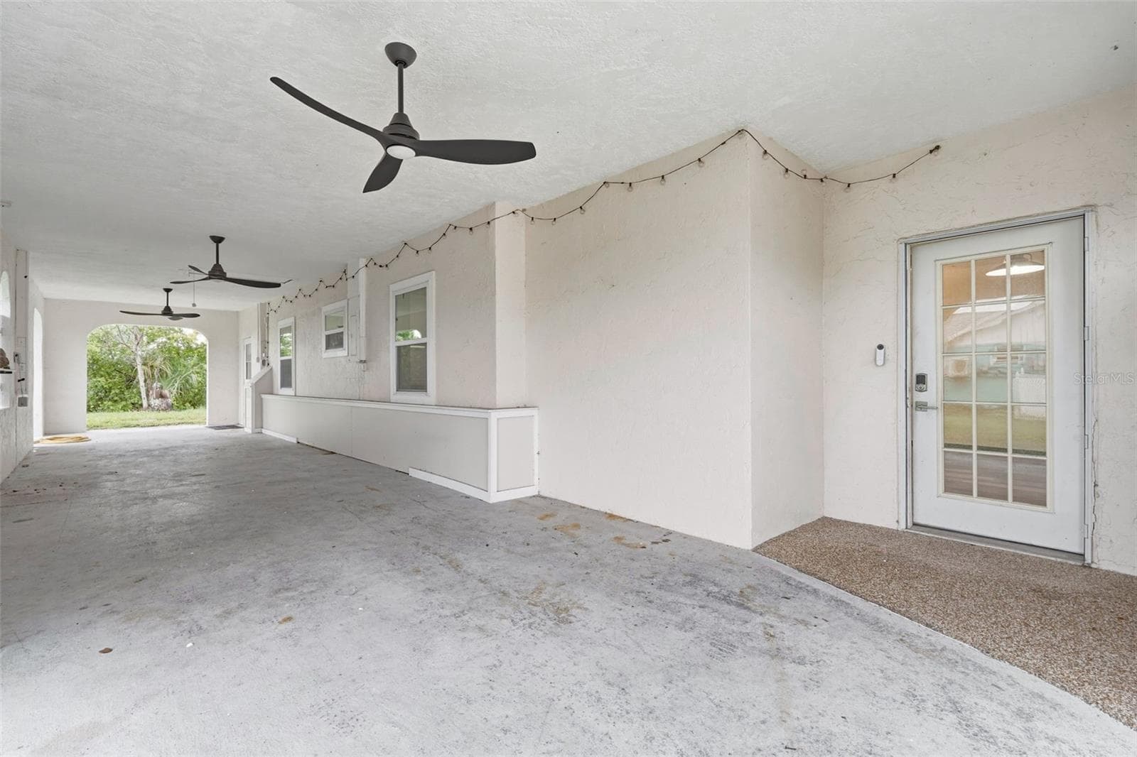 Expansive Tandem 3-Car Carport with triple Bahama Style Fans - 1005 ALSTON LN, ENGLEWOOD