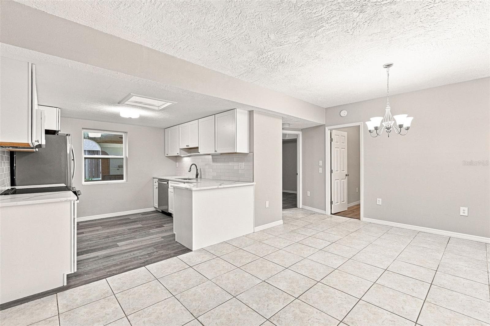 Open Dining Area Flowing Seamlessly Into Updated Kitchen - 1005 ALSTON LN, ENGLEWOOD