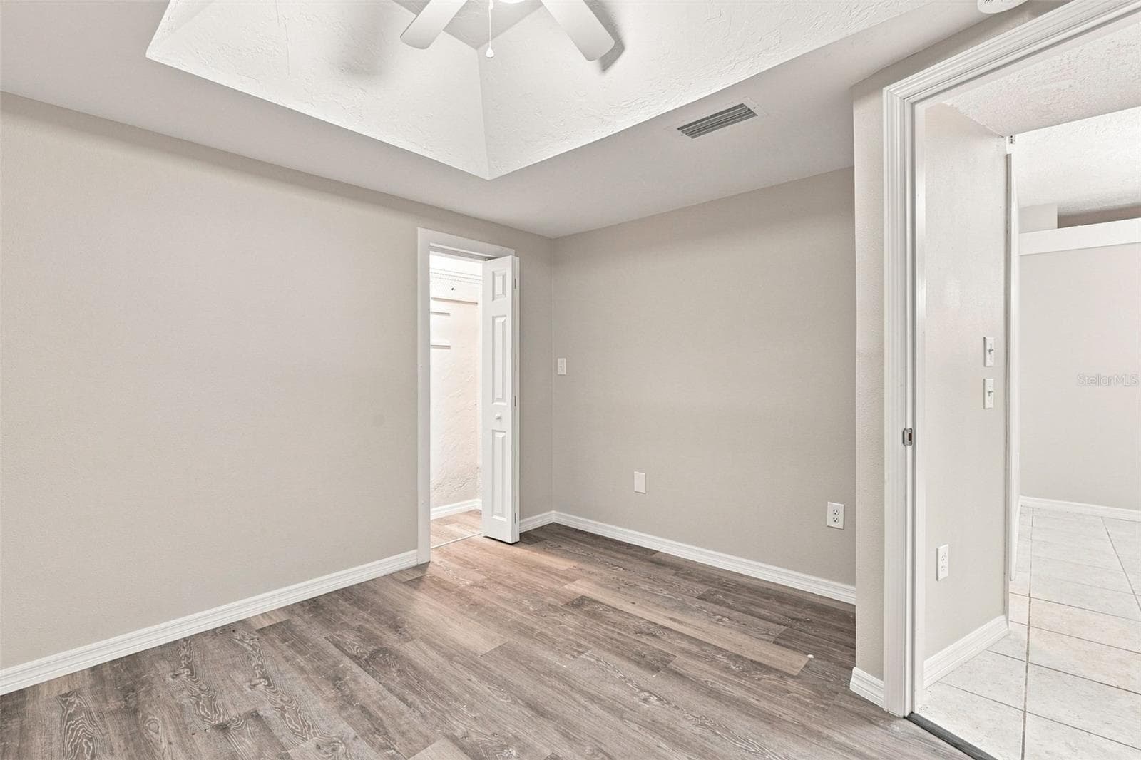 Third Bedroom with Walk-in Closet and Tray Ceiling with Fan - 1005 ALSTON LN, ENGLEWOOD