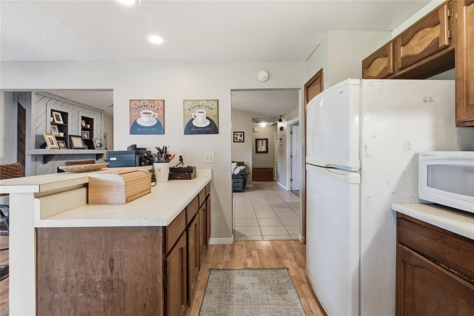Kitchen View to Great Room - 3028 WOOD SONG CT, MULBERRY