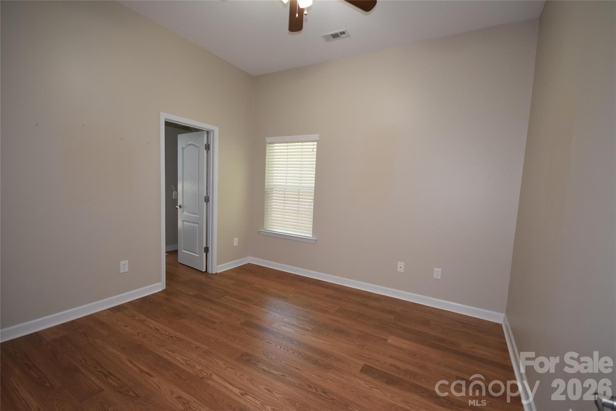 Bedroom with walk in closet with window in closet - 713 Trailhead Lane, Fort Mill