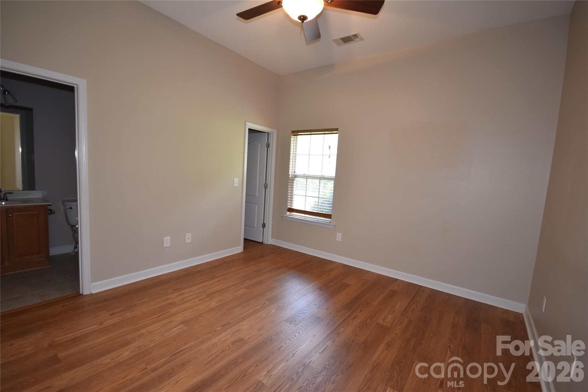 Bedroom with private bathroom and walk in closet - 713 Trailhead Lane, Fort Mill