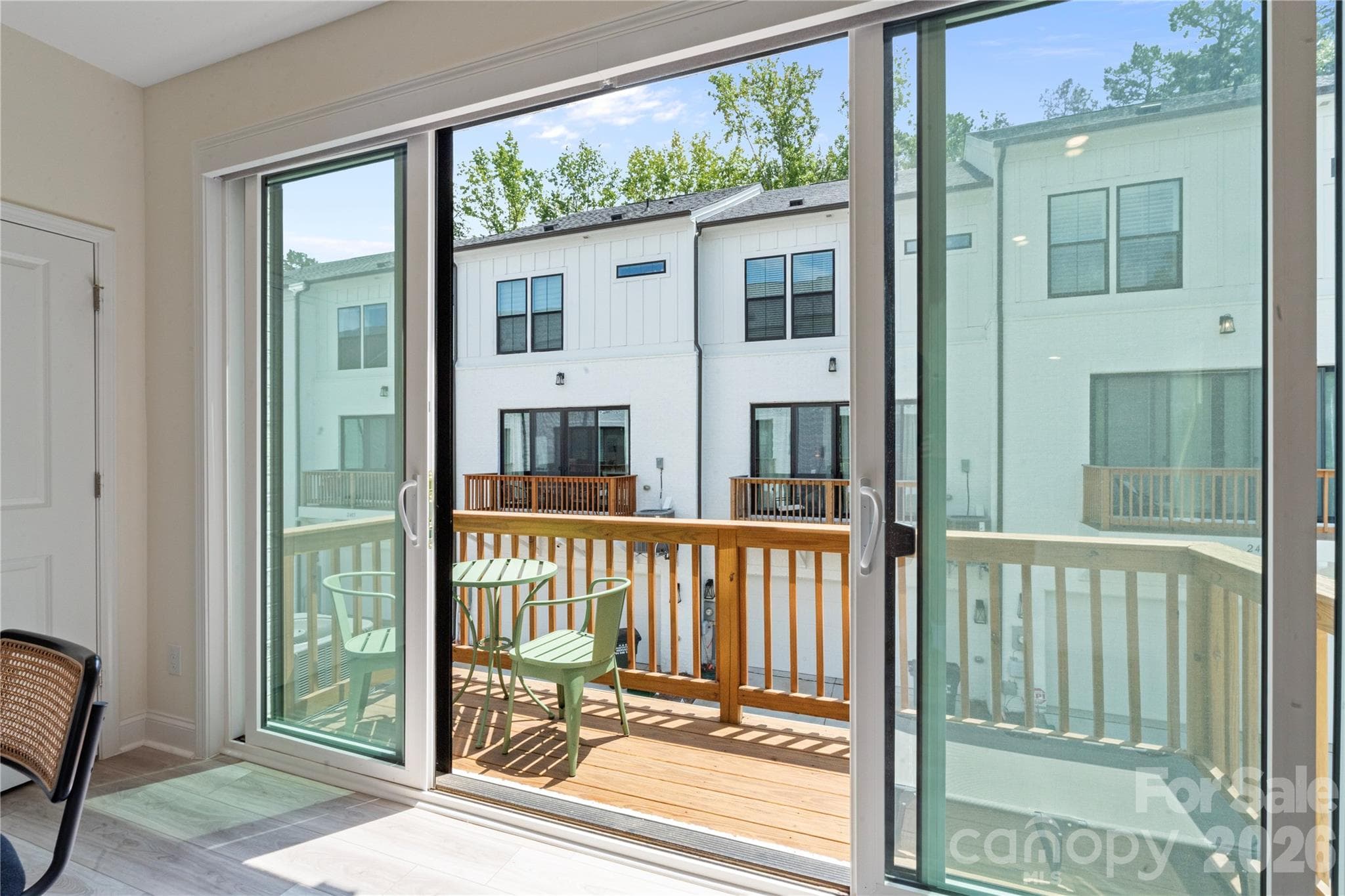 Rear Patio with remote controlled window shade - 2414 Magnolia Blossom Way, Charlotte