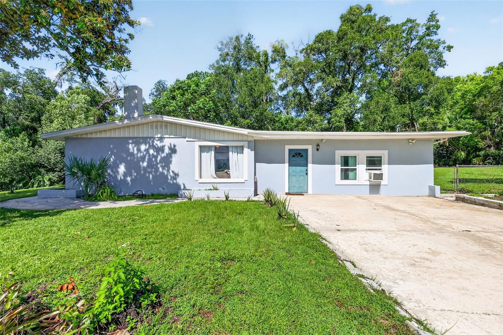 Oversized driveway with direct access to the Primary Bedroom/potential attached in-law suite. - 428 RUTH ST, LONGWOOD