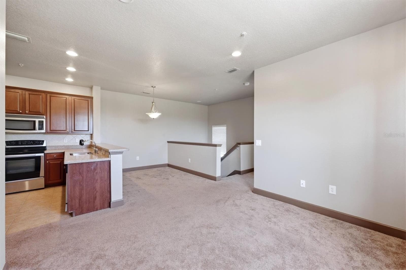 Living Room - 8098 MOONSTONE DR #17-203, SARASOTA