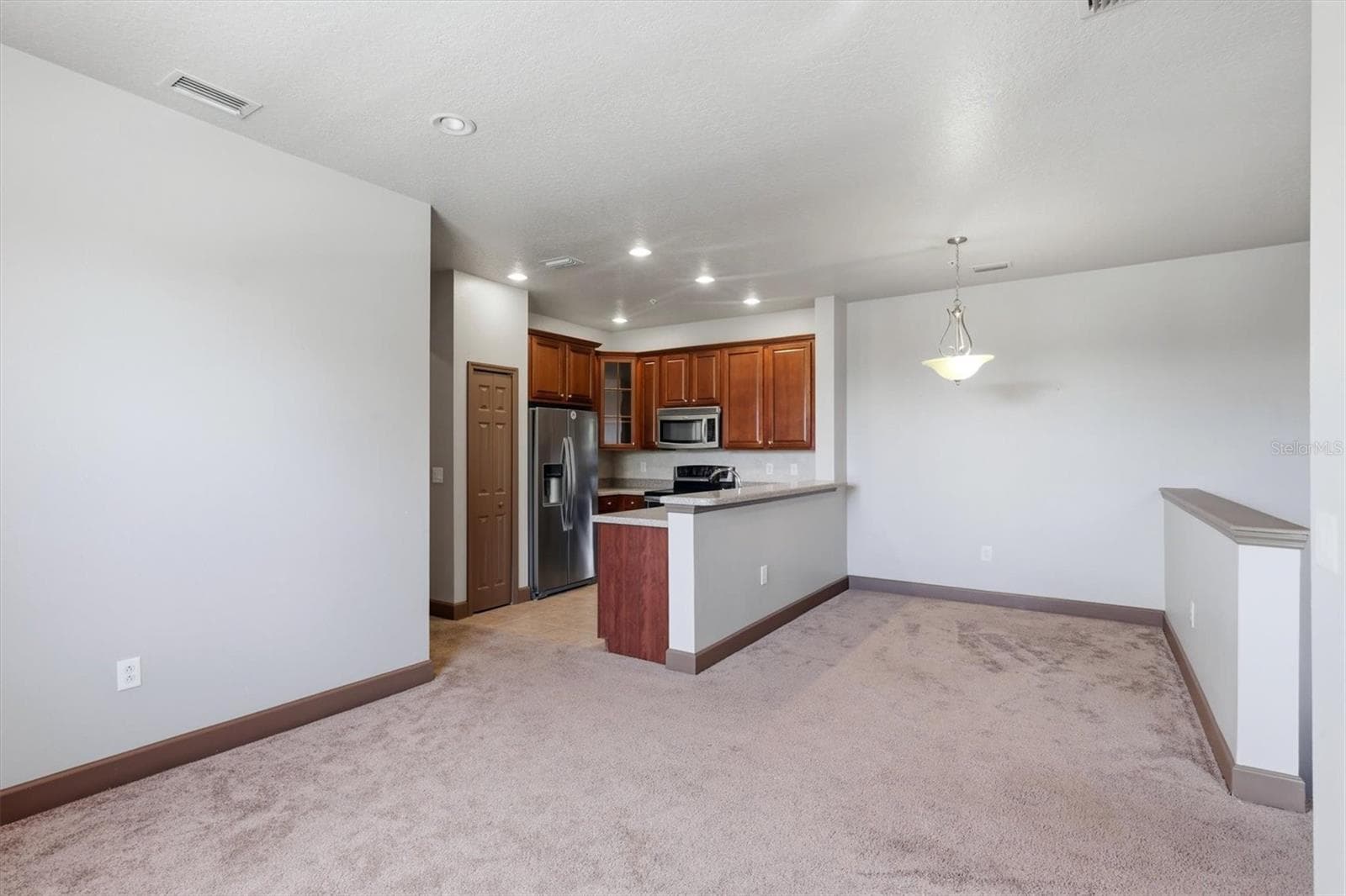Living Room - 8098 MOONSTONE DR #17-203, SARASOTA