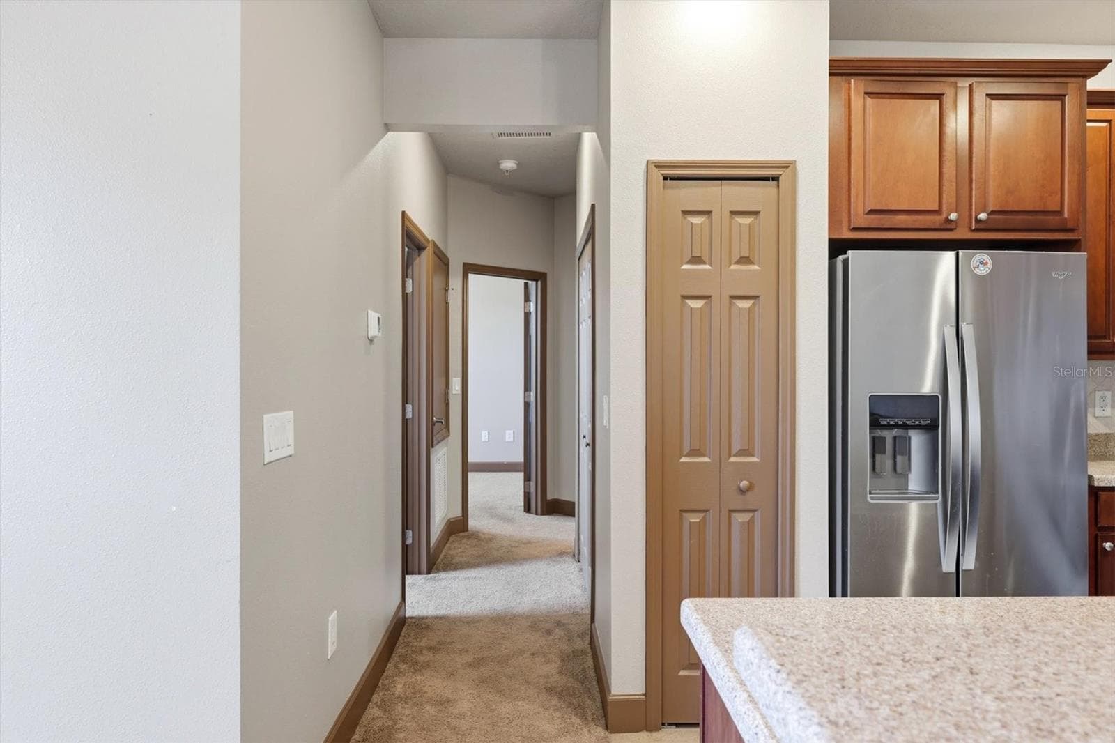 Hallway to bedrooms - 8098 MOONSTONE DR #17-203, SARASOTA