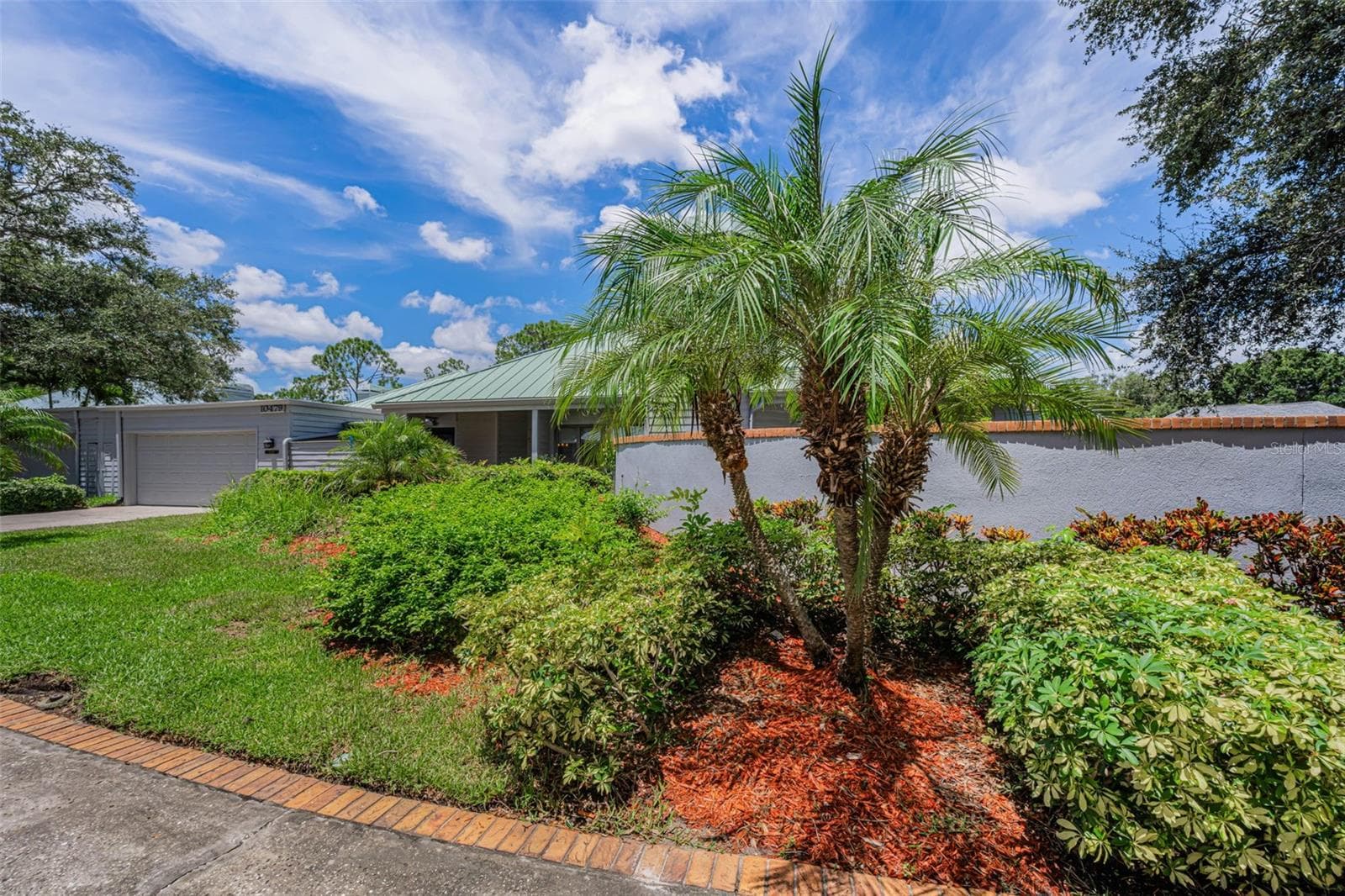 New front landscaping! - 10479 LONGWOOD DR, SEMINOLE