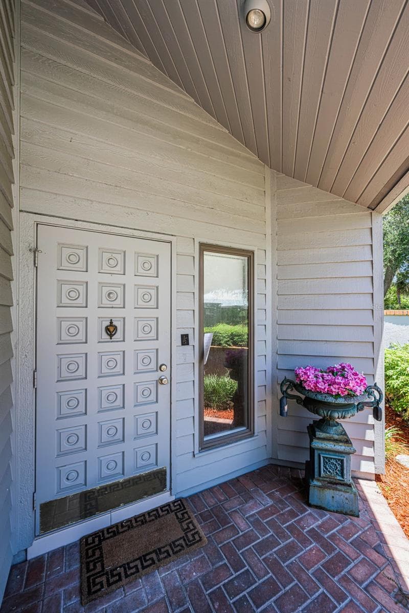 Charming covered entrance! - 10479 LONGWOOD DR, SEMINOLE