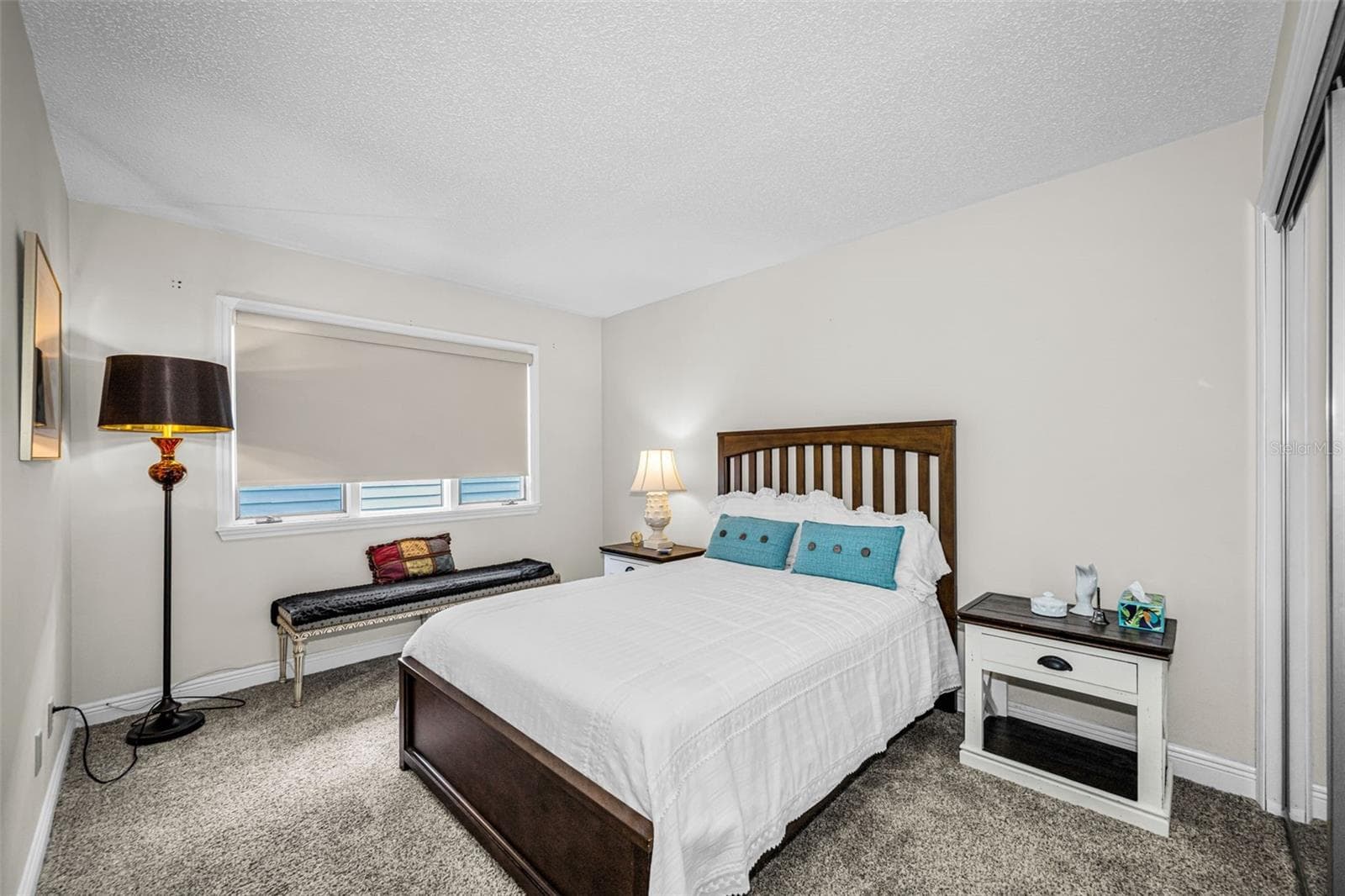 Second bedroom with large 9' closet, adjacent to hall bath. - 10479 LONGWOOD DR, SEMINOLE