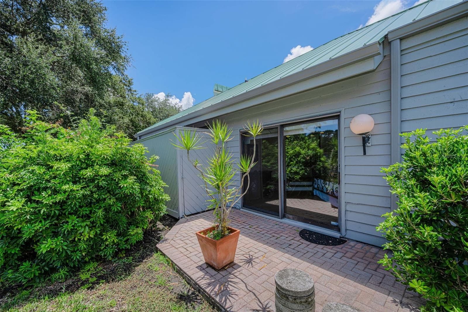 Patio outside the master bedroom and could have a pool view!!! - 10479 LONGWOOD DR, SEMINOLE