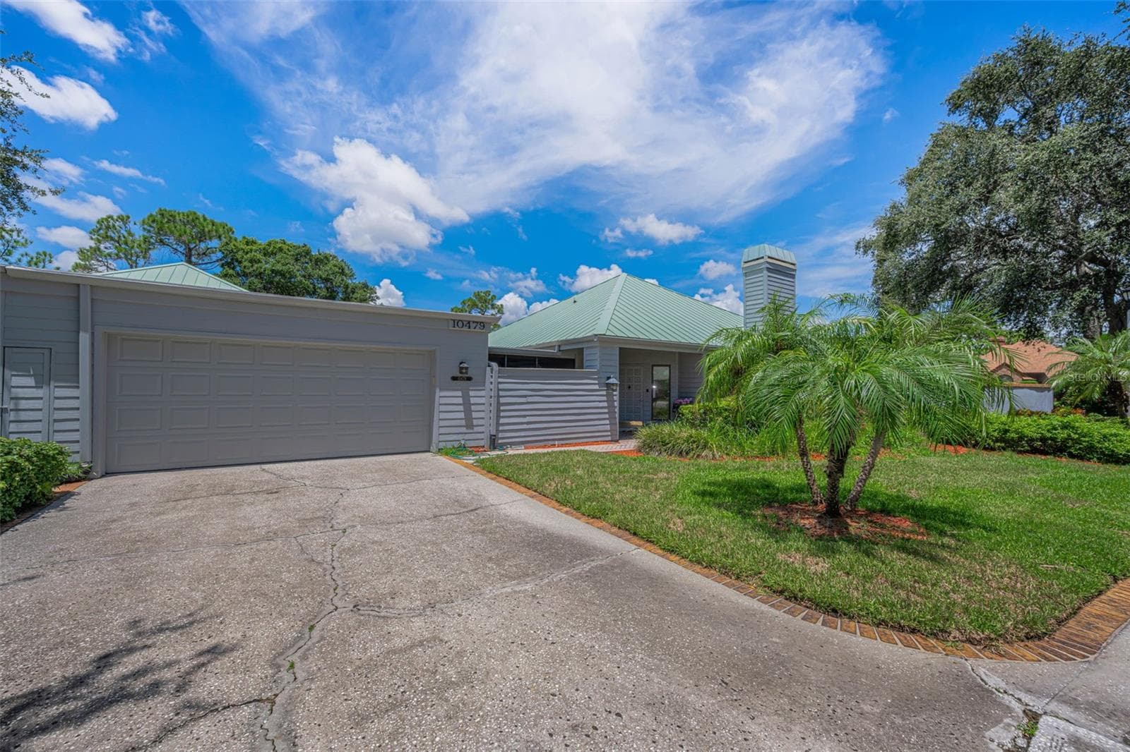 Two car garage and private driveway! - 10479 LONGWOOD DR, SEMINOLE