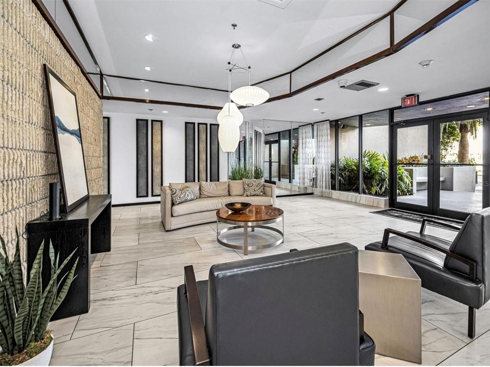 Greet your guests in the spacious lobby. - 1660 GULF BLVD #PH1, CLEARWATER BEACH