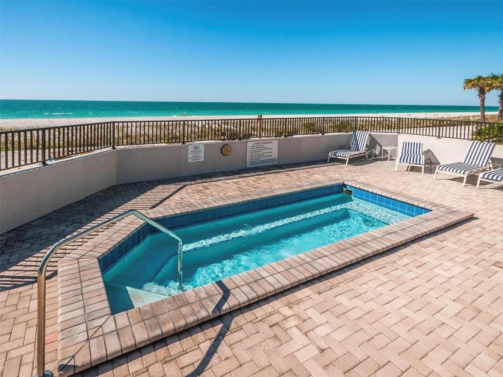 Enjoy the heated spa as the sun sinks below the horizon. - 1660 GULF BLVD #PH1, CLEARWATER BEACH