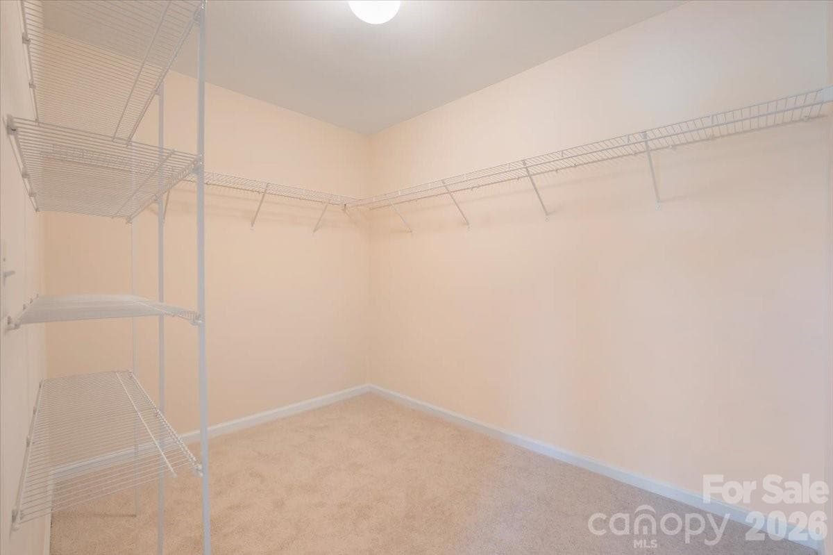 Primary suite Walk in closet - 15505 Davidson East Drive, Davidson