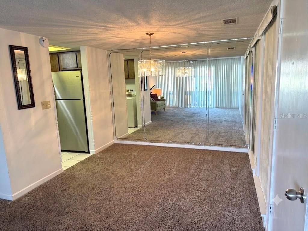 UNSTAGED DINING AREA - 42 CLUB HOUSE DR #207, PALM COAST