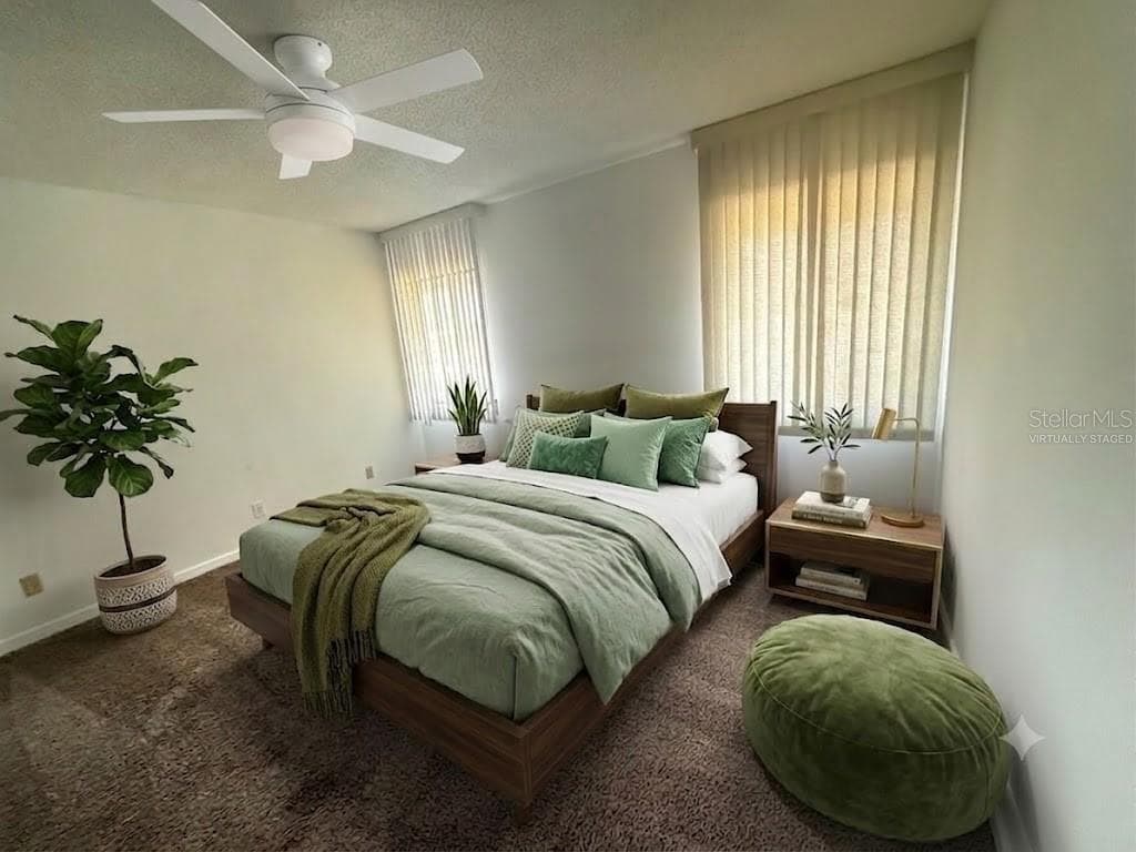VIRTUALLY STAGED GUEST BEDROOM WITH NEW FAN/LIGHT - 42 CLUB HOUSE DR #207, PALM COAST
