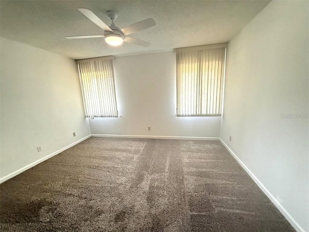 UNSTAGED GUEST BEDROOM - 42 CLUB HOUSE DR #207, PALM COAST
