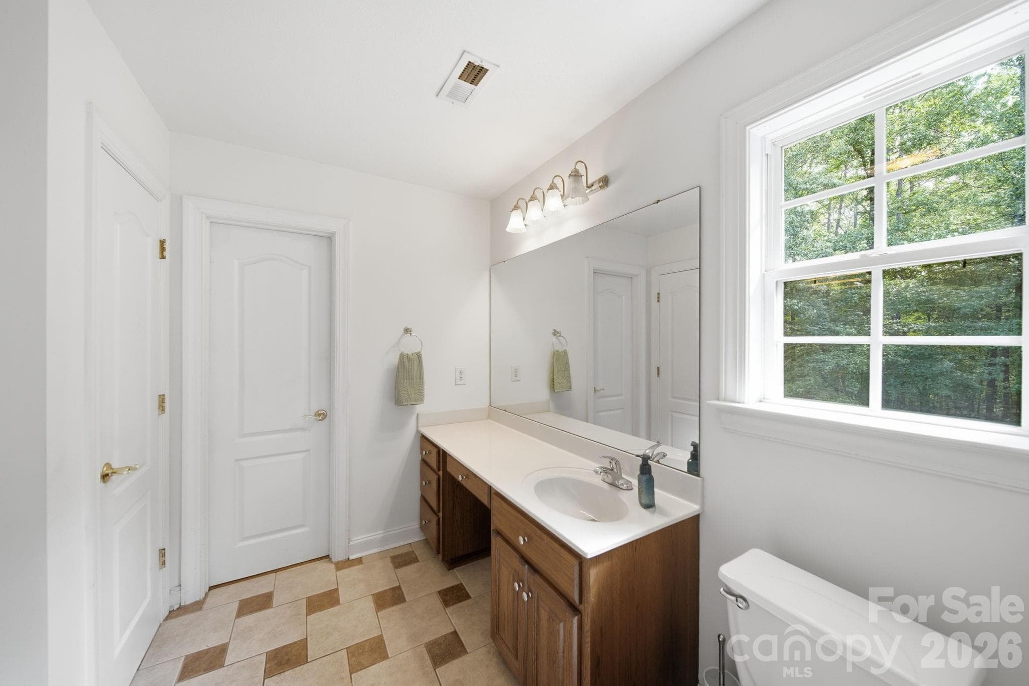 Primary bathroom #2 upstairs with walk in closet - 2806 Iveywood Drive, Monroe