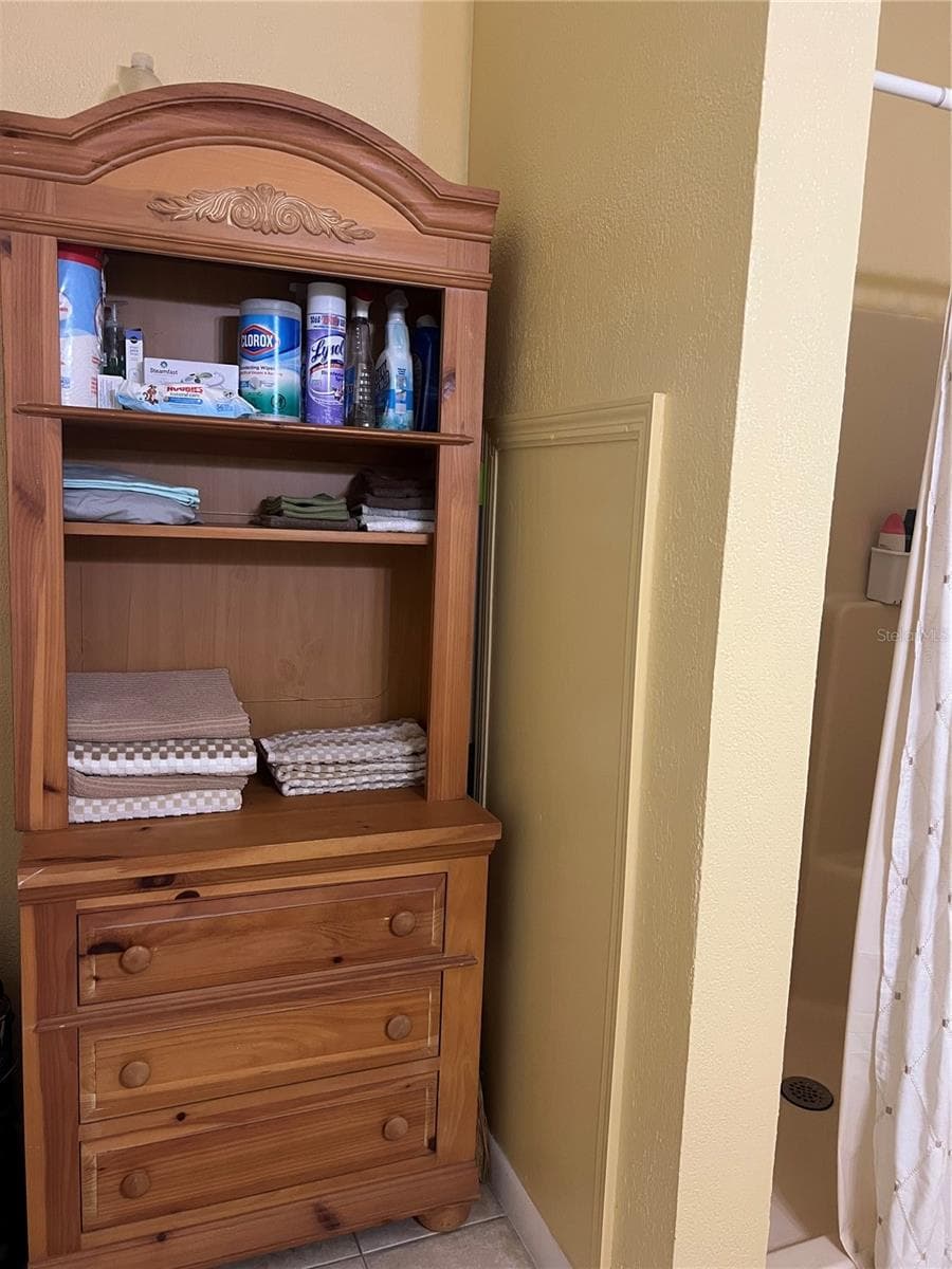 Guest House bathroom cabinet storage - 267 N ORANGE AVE, LAKE HELEN