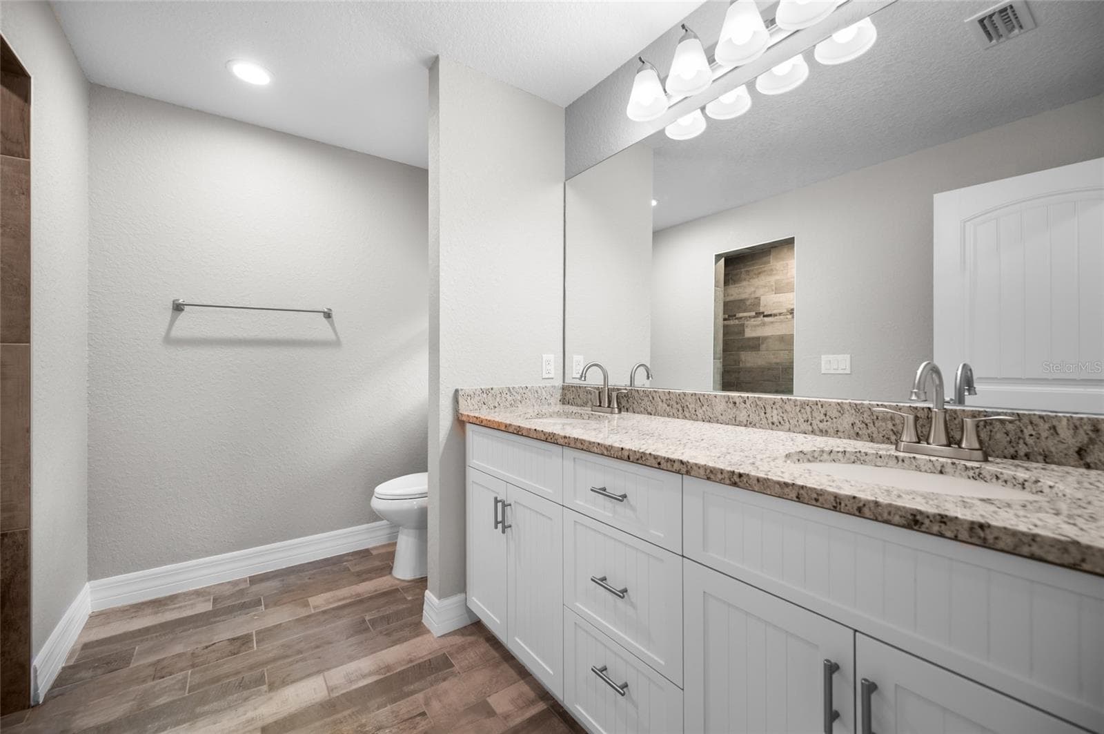 Matching Granite counter tops throughout the home. - 315 SWEETWATER DR, ROTONDA WEST