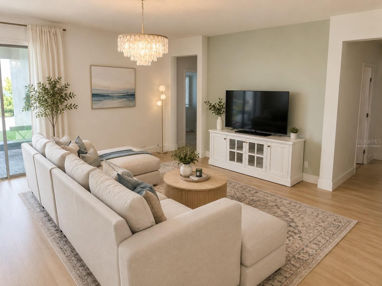 14048 Larkspur Lake Dr -Open-concept living room with a light, airy luxe coastal feel. Virtually staged. - 14048 LARKSPUR LAKE DR, WINTER GARDEN