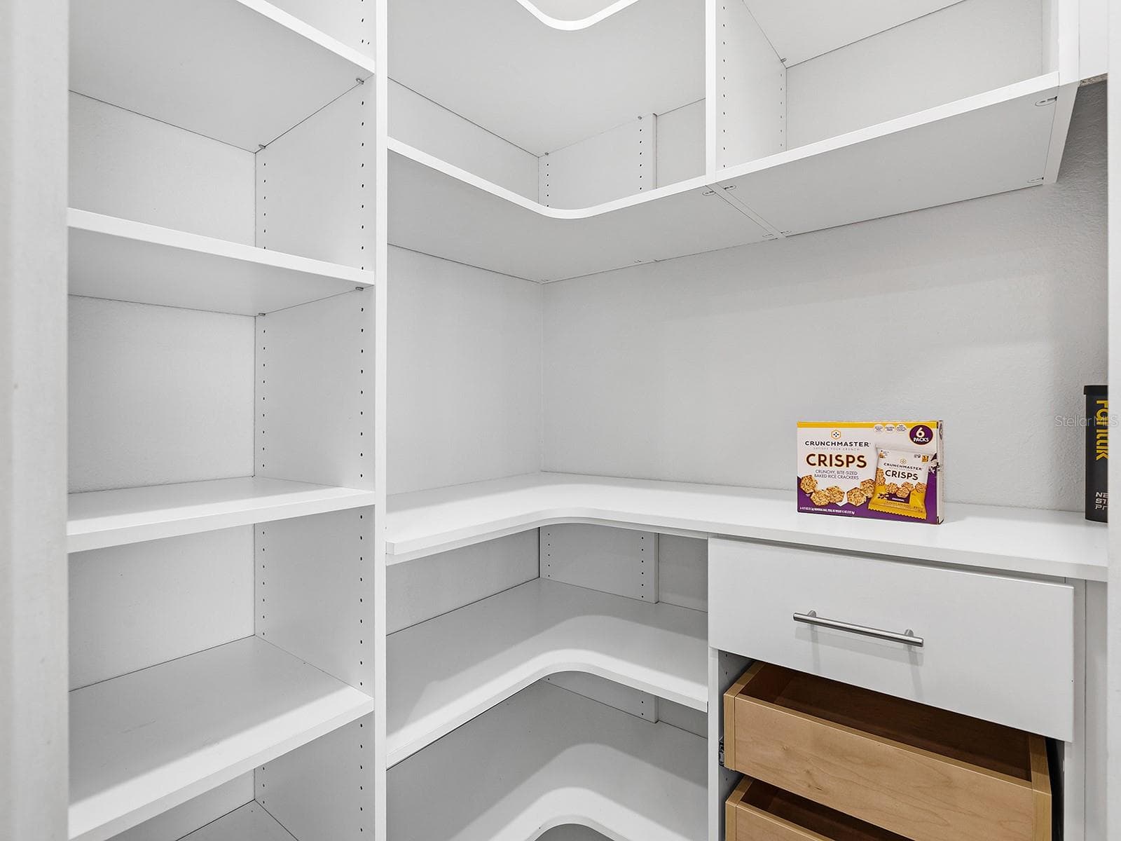 Walk-in pantry with custom shelving - 7115 MARSH VIEW TER, BRADENTON