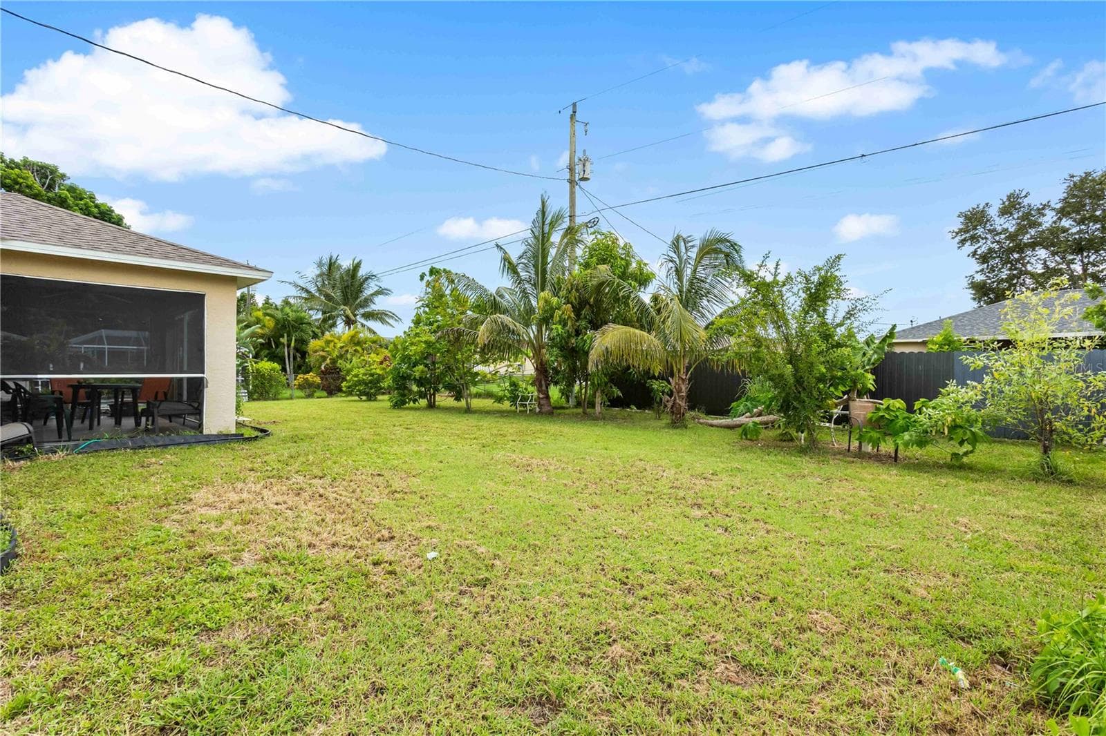SEVERAL MATURE FRUIT TREES ALREADY IN PLACE for YOU TO ENJOY! - 1728 NE 22ND TER, CAPE CORAL