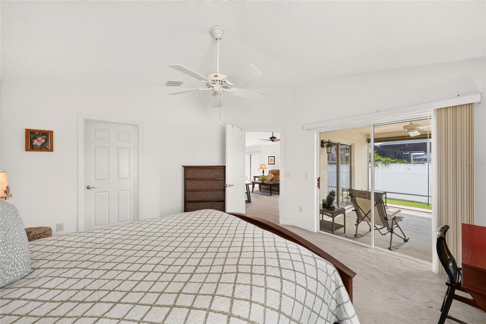 Primary bedroom with lanai access - 1049 JACKSON ST, THE VILLAGES