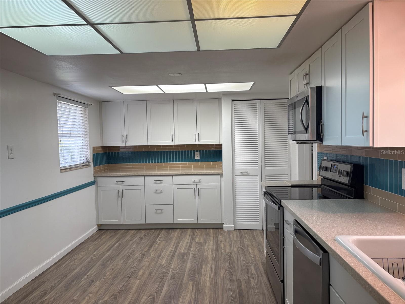 Kitchen Extra Storage Cabinets - 3276 BRUNSWICK LN #705, SARASOTA