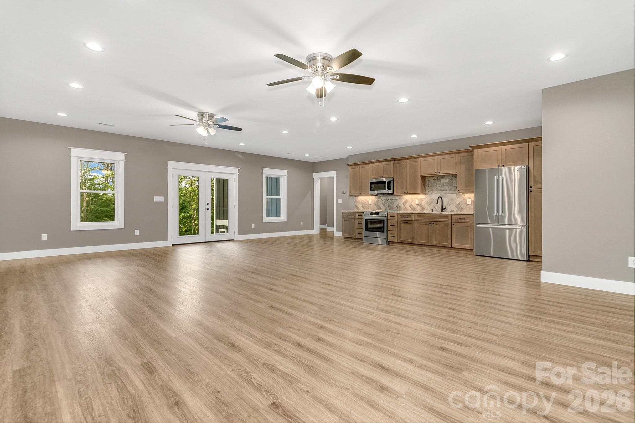 Downstairs family room and kitchenette - 143 Sunny Morning Court, Hendersonville