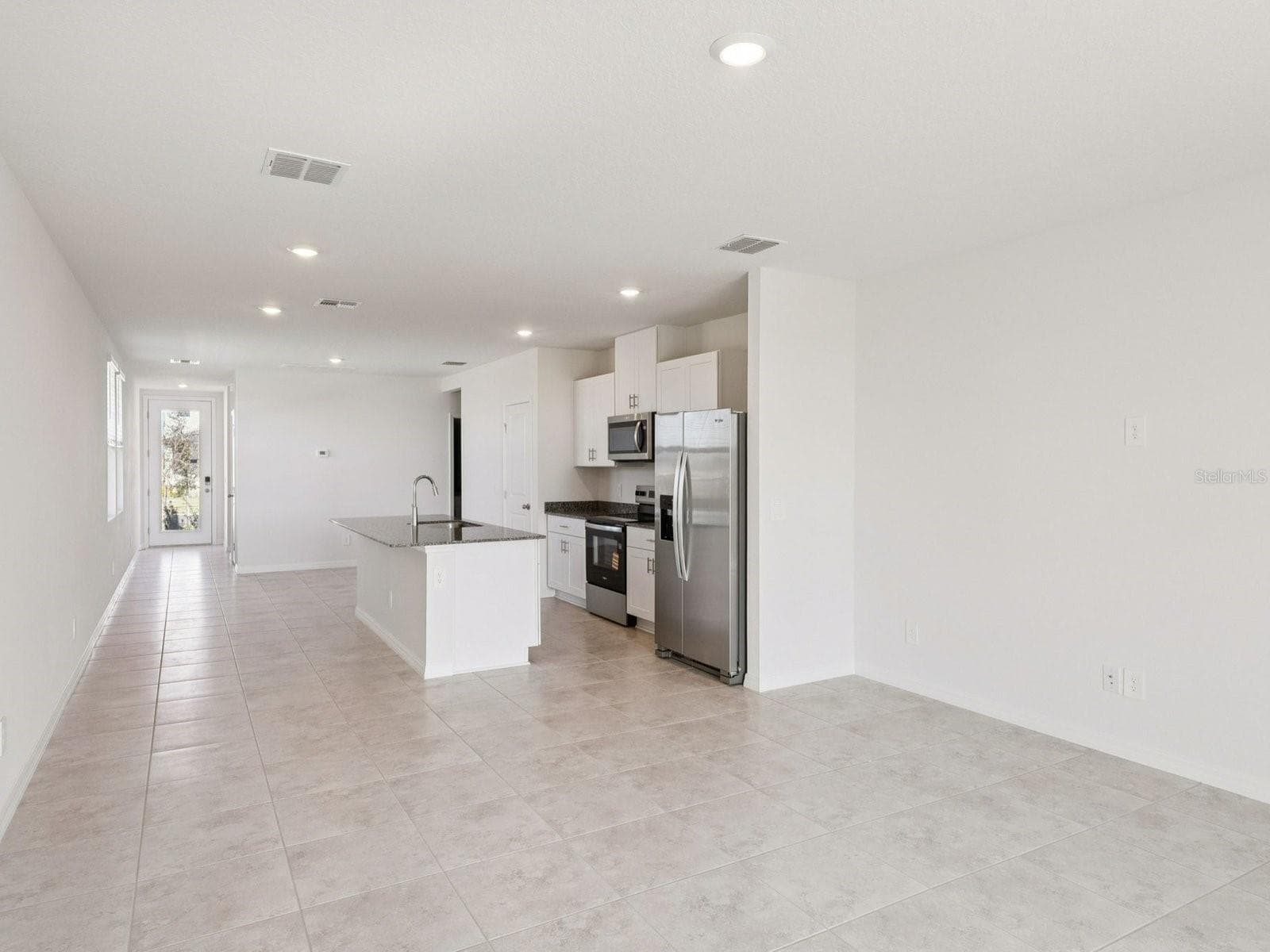 Photo is not of the actual home, but is an inspirational photo of builder’s model home and may depict options, furnishings, and/or decorator features that are not included - 729 IMPALA RD, LAKE ALFRED