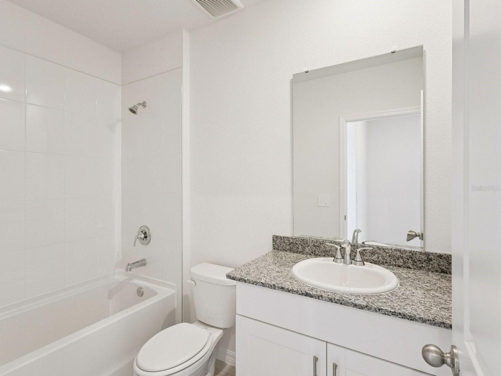 Photo is not of the actual home, but is an inspirational photo of builder’s model home and may depict options, furnishings, and/or decorator features that are not included - 729 IMPALA RD, LAKE ALFRED