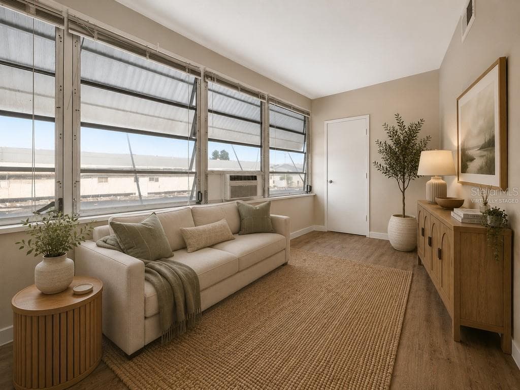Virtually Staged Florida room - 6015 19TH ST N #215, ST PETERSBURG