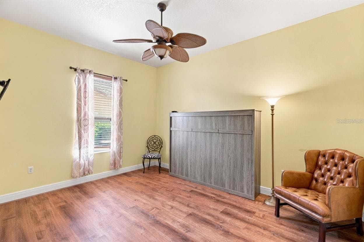 Guest bedroom #1 with a Murphy bed. - 970 SAN RAPHAEL ST, POINCIANA