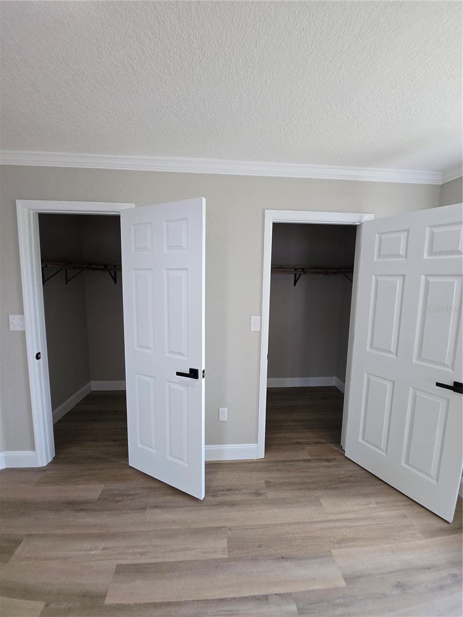 Master bedroom features TWO walk-in closets. - 37406 VISTA DR, DADE CITY