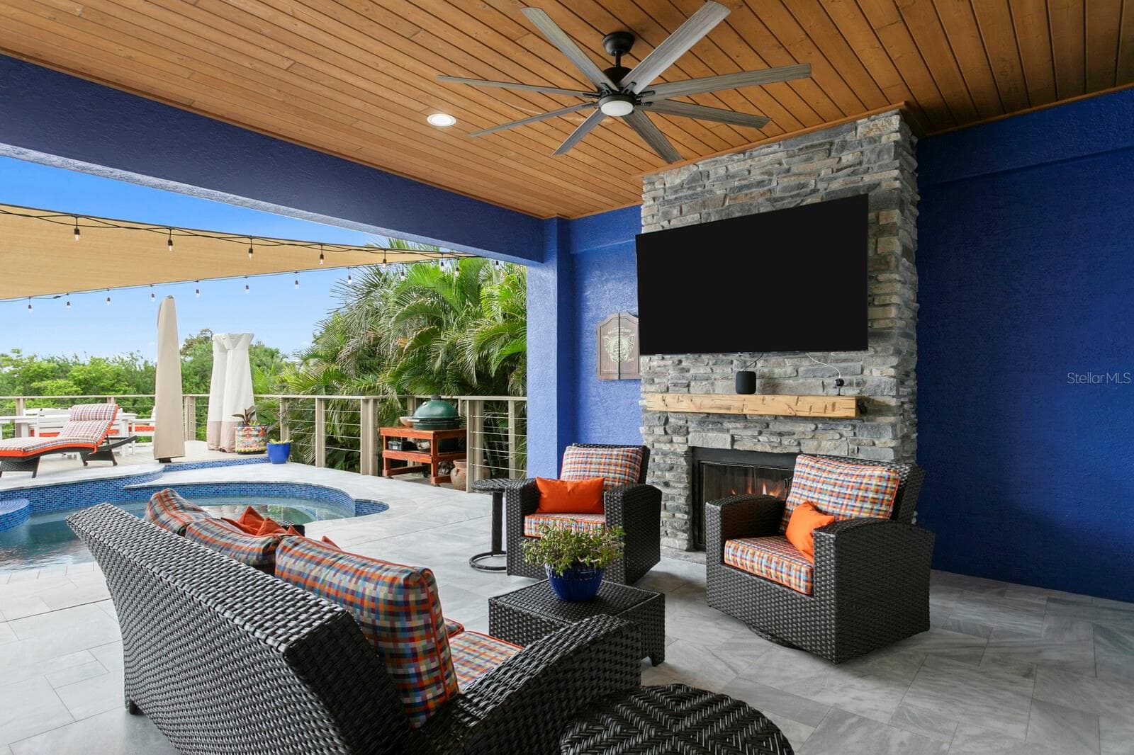 View from covered Patio overlooking custom deck railing and canal - 704 EAGLE LN, APOLLO BEACH