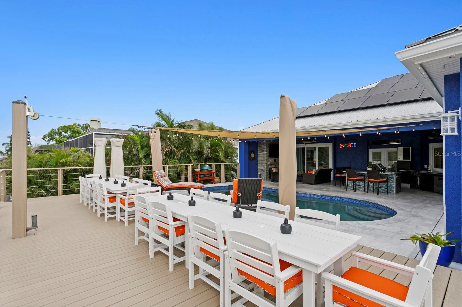 Composite deck measures over 600 sq ft with custom deck rail - 704 EAGLE LN, APOLLO BEACH