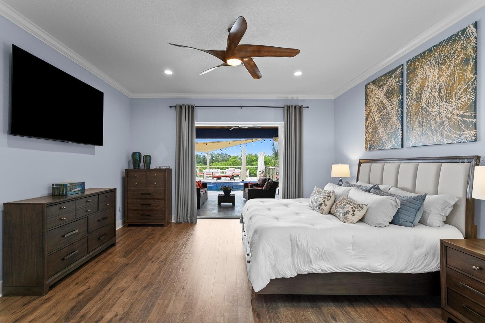 Enjoy backyard oasis views from your new Primary Bedroom - 704 EAGLE LN, APOLLO BEACH