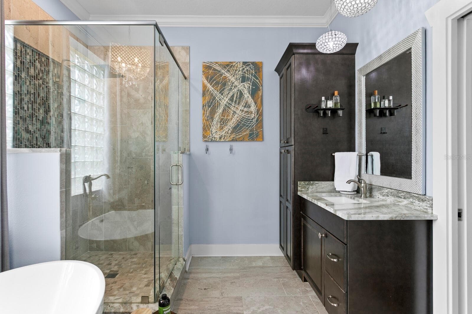Tile shower with glass tile accent wall - 704 EAGLE LN, APOLLO BEACH