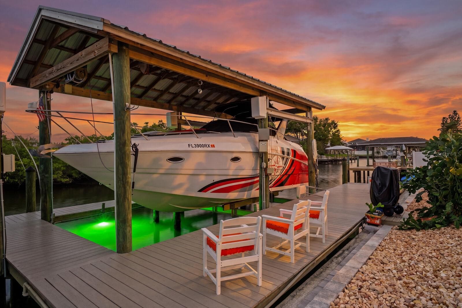 12,000 lbs Neptune boat lift with Mantis dock lighting - 704 EAGLE LN, APOLLO BEACH