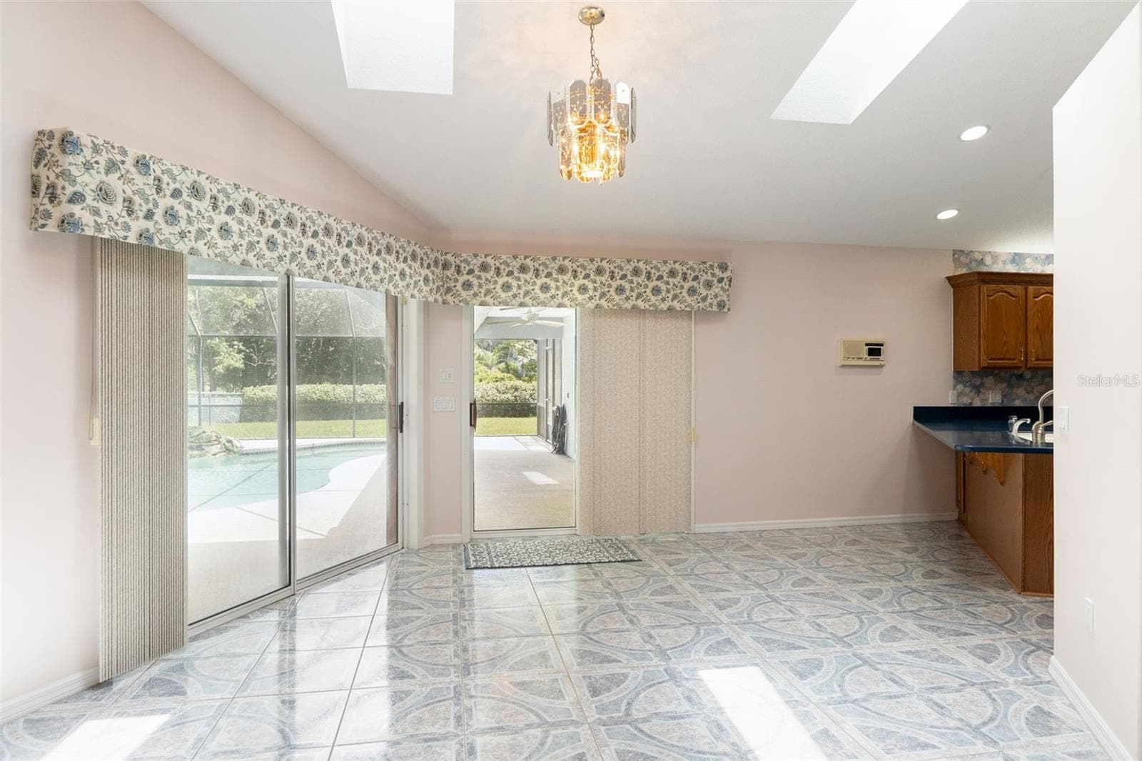 Open Dining to kitchen - 23 WELLSTREAM LN, PALM COAST