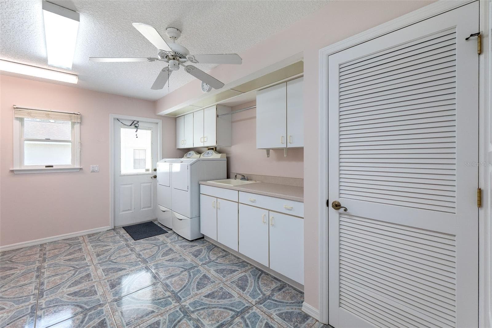 Look at this laundry room - 23 WELLSTREAM LN, PALM COAST