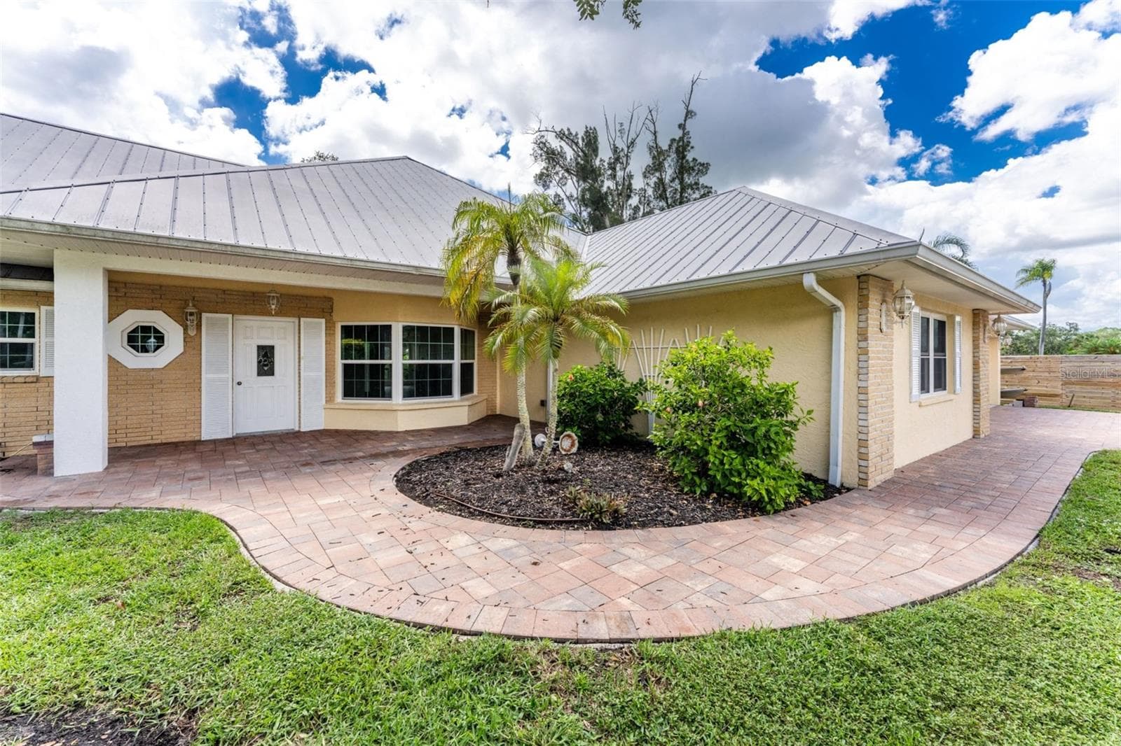 Paver sidewalk entry is stylish! - 200 S OXFORD DR, ENGLEWOOD