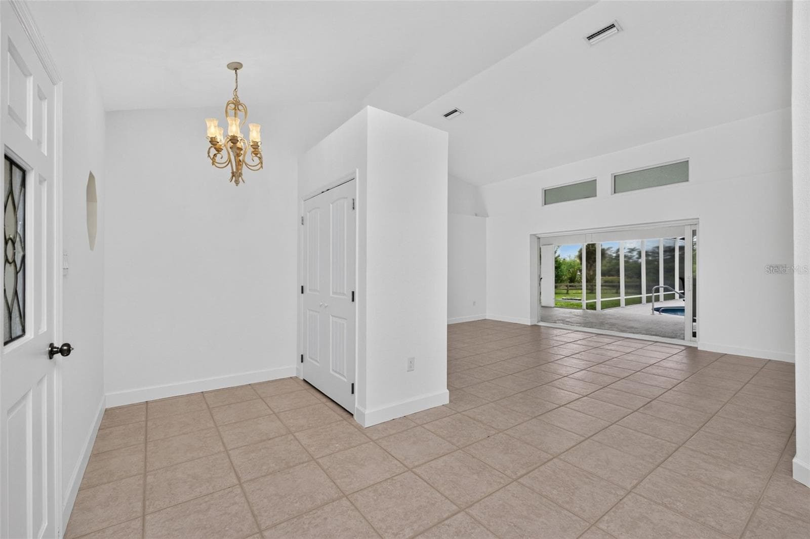 There's a small nook and coat closet to the left of the entrance door - 200 S OXFORD DR, ENGLEWOOD