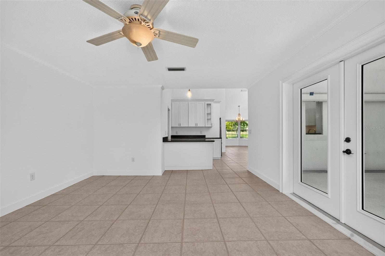 Family room has French doors opening onto the lanai - 200 S OXFORD DR, ENGLEWOOD
