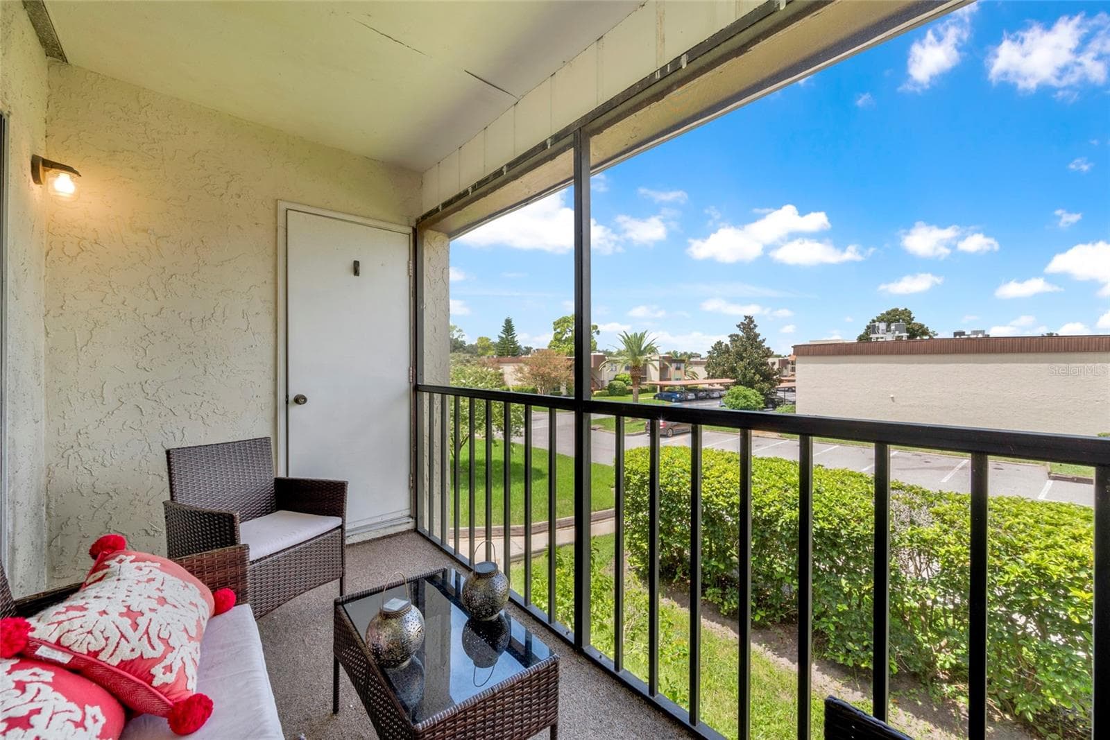 Balcony and storage closet - 2400 WINDING CREEK BLVD #17-203, CLEARWATER