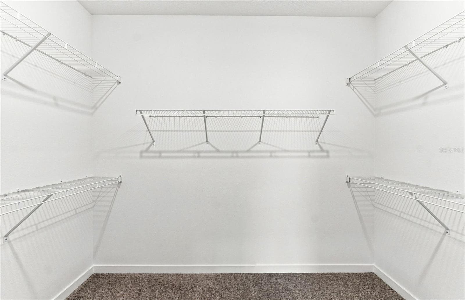 Owner's Walk-in Closet - 33335 HERDS HALLOW WAY, WESLEY CHAPEL