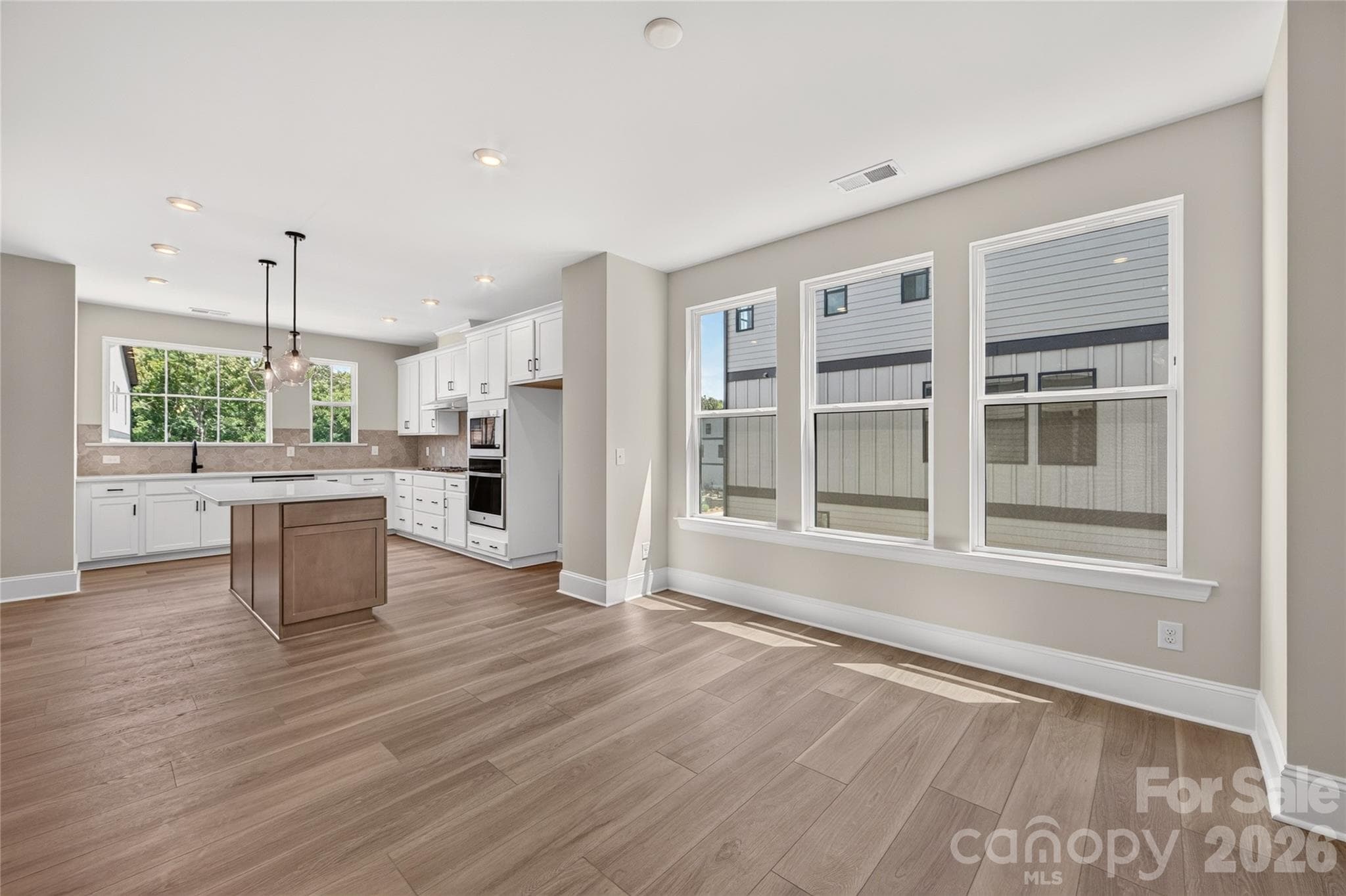 Open living space filled with natural light - 403 Old Town Village Road, Waxhaw
